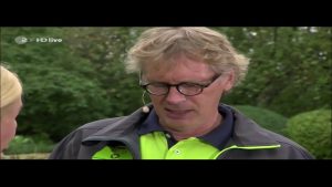 Rasenpflege in Herbst